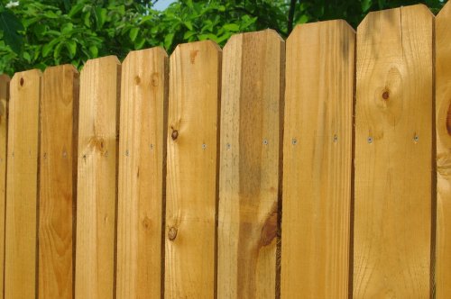 A wooden fence was installed for a residential home in Palm Beach County, FL.