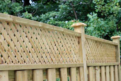 Custom-designed wooden fence installed by Fencing South Florida in Palm Beach County, FL